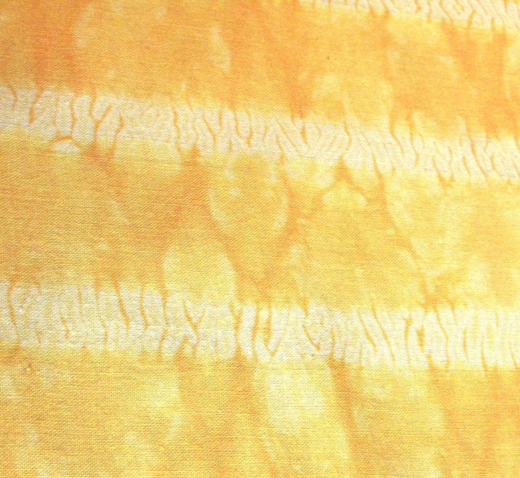 Close up - mokume shibori stitch-resist dyed fabric